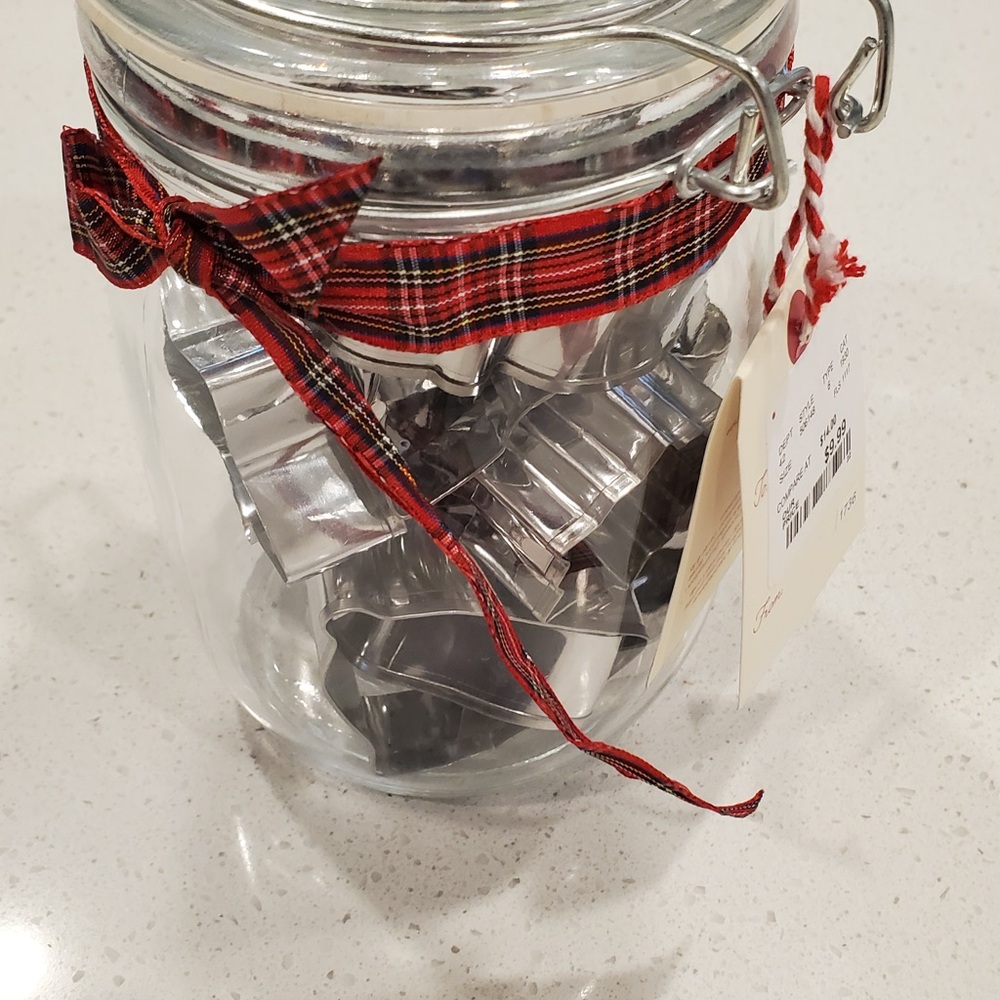 Holiday baking set
Glass Jar with Silver Cookie Cutters and Red Plaid Ribbon